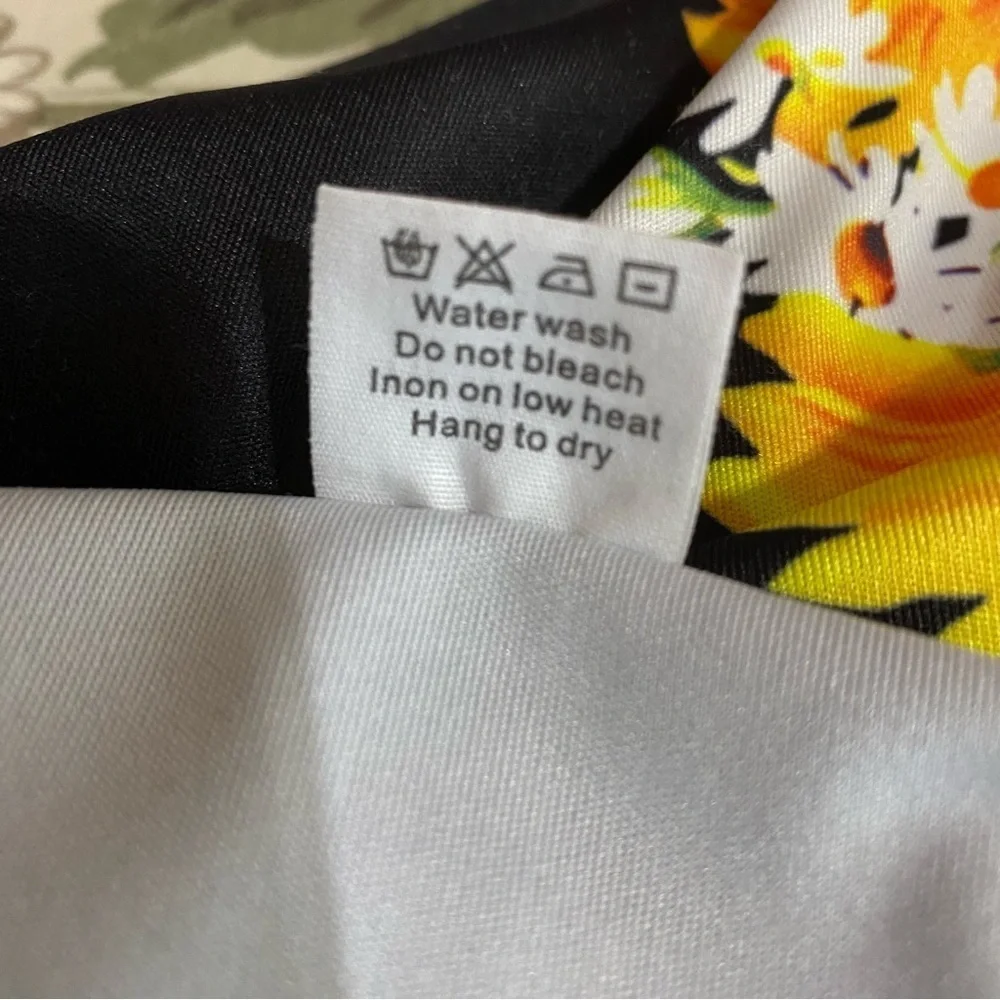 Funnycokid Bold Sunflower Sleeveless Black Dress